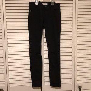 Black Daisy black jegging with rips in knees